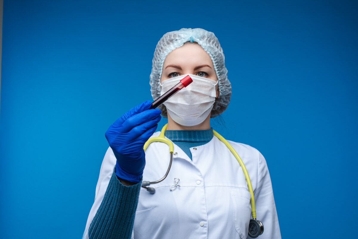 Doctor with a blood test in tube